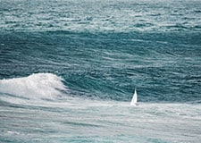 Rudderless boat in bad storm